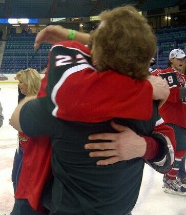 Nathan MacKinnon hugs his father Graham after capturing 2013 Memorial Cup